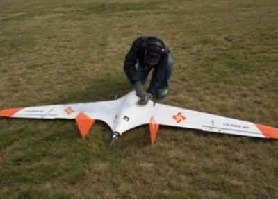 Preparing an AU-200 Stealth Wing UAV drone for operation